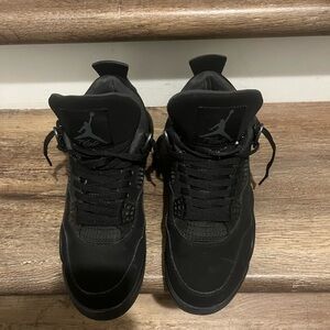 Black cat jordan 4s used
